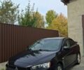 Черный Мицубиси Лансер, объемом двигателя 2 л и пробегом 244 тыс. км за 6700 $, фото 1 на Automoto.ua