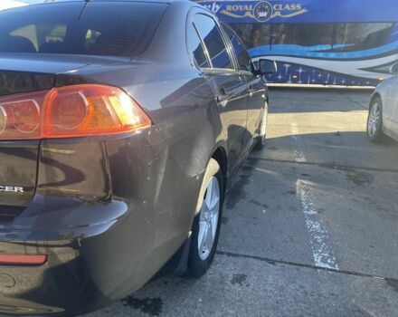 Черный Мицубиси Лансер, объемом двигателя 2 л и пробегом 372 тыс. км за 6200 $, фото 6 на Automoto.ua