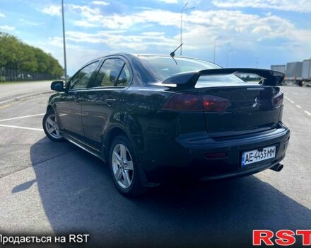 Чорний Міцубісі Lancer, об'ємом двигуна 2 л та пробігом 345 тис. км за 5999 $, фото 2 на Automoto.ua