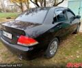 Чорний Міцубісі Lancer, об'ємом двигуна 1.6 л та пробігом 227 тис. км за 4100 $, фото 4 на Automoto.ua