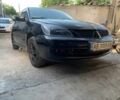 Чорний Міцубісі Lancer, об'ємом двигуна 1.6 л та пробігом 250 тис. км за 4192 $, фото 1 на Automoto.ua