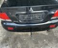 Чорний Міцубісі Lancer, об'ємом двигуна 1.6 л та пробігом 246 тис. км за 1200 $, фото 1 на Automoto.ua