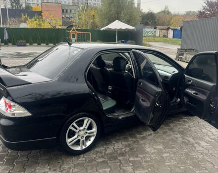 Чорний Міцубісі Lancer, об'ємом двигуна 2 л та пробігом 210 тис. км за 5500 $, фото 16 на Automoto.ua