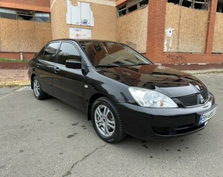 Черный Мицубиси Лансер, объемом двигателя 1.6 л и пробегом 173 тыс. км за 4700 $, фото 6 на Automoto.ua