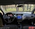 Черный Мицубиси Лансер, объемом двигателя 1.6 л и пробегом 224 тыс. км за 4500 $, фото 6 на Automoto.ua