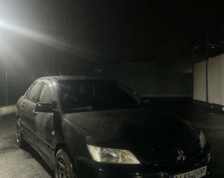 Черный Мицубиси Лансер, объемом двигателя 1.6 л и пробегом 211 тыс. км за 5700 $, фото 15 на Automoto.ua