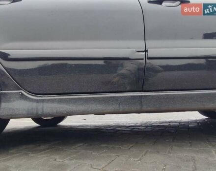 Чорний Міцубісі Lancer, об'ємом двигуна 2 л та пробігом 145 тис. км за 5000 $, фото 11 на Automoto.ua