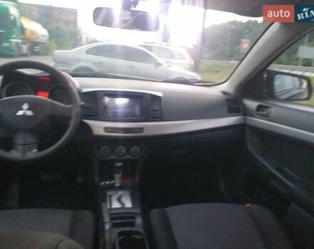 Черный Мицубиси Лансер, объемом двигателя 1.5 л и пробегом 270 тыс. км за 4500 $, фото 16 на Automoto.ua