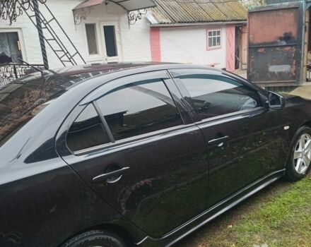 Чорний Міцубісі Lancer, об'ємом двигуна 2 л та пробігом 273 тис. км за 7100 $, фото 5 на Automoto.ua