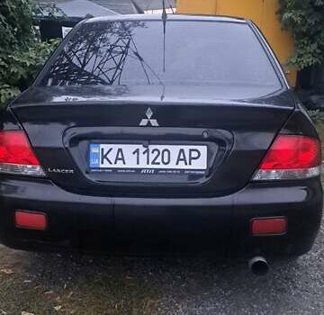 Чорний Міцубісі Lancer, об'ємом двигуна 1.6 л та пробігом 234 тис. км за 3900 $, фото 5 на Automoto.ua