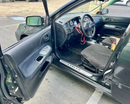Чорний Міцубісі Lancer, об'ємом двигуна 1.6 л та пробігом 228 тис. км за 3499 $, фото 2 на Automoto.ua