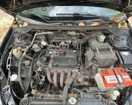 Чорний Міцубісі Lancer, об'ємом двигуна 1.58 л та пробігом 234 тис. км за 3800 $, фото 14 на Automoto.ua