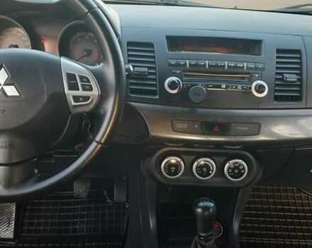 Міцубісі Lancer 2007 у Києві на Automoto.ua Чорний Міцубісі Lancer, об'ємом двигуна 2 л та пробігом 238 тис. км за 5350 $, фото 13 на Automoto.ua