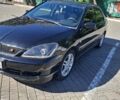 Чорний Міцубісі Lancer, об'ємом двигуна 2 л та пробігом 174 тис. км за 4800 $, фото 1 на Automoto.ua