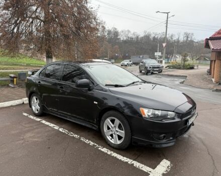 Черный Мицубиси Лансер, объемом двигателя 2 л и пробегом 281 тыс. км за 6000 $, фото 4 на Automoto.ua