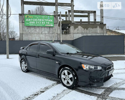 Чорний Міцубісі Lancer, об'ємом двигуна 2 л та пробігом 199 тис. км за 7000 $, фото 3 на Automoto.ua