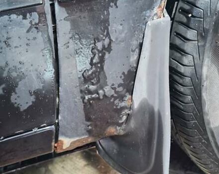 Черный Мицубиси Лансер, объемом двигателя 1.6 л и пробегом 185 тыс. км за 3300 $, фото 9 на Automoto.ua