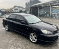 Чорний Міцубісі Lancer, об'ємом двигуна 2 л та пробігом 210 тис. км за 5500 $, фото 5 на Automoto.ua
