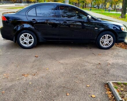 Черный Мицубиси Лансер, объемом двигателя 1.5 л и пробегом 207 тыс. км за 5500 $, фото 2 на Automoto.ua