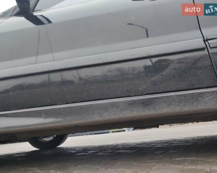 Чорний Міцубісі Lancer, об'ємом двигуна 2 л та пробігом 145 тис. км за 5000 $, фото 16 на Automoto.ua