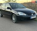 Черный Мицубиси Лансер, объемом двигателя 1.58 л и пробегом 139 тыс. км за 5200 $, фото 12 на Automoto.ua