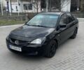 Черный Мицубиси Лансер, объемом двигателя 1.6 л и пробегом 277 тыс. км за 3299 $, фото 1 на Automoto.ua