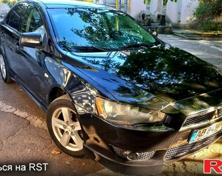 Черный Мицубиси Лансер, объемом двигателя 2 л и пробегом 290 тыс. км за 5800 $, фото 5 на Automoto.ua