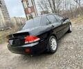 Чорний Міцубісі Lancer, об'ємом двигуна 1.6 л та пробігом 216 тис. км за 4990 $, фото 4 на Automoto.ua