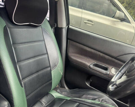 Чорний Міцубісі Lancer, об'ємом двигуна 2 л та пробігом 210 тис. км за 5500 $, фото 39 на Automoto.ua