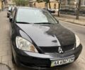Чорний Міцубісі Lancer, об'ємом двигуна 1.6 л та пробігом 153 тис. км за 5500 $, фото 1 на Automoto.ua