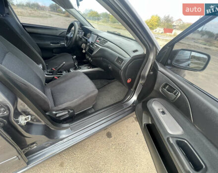 Чорний Міцубісі Lancer, об'ємом двигуна 1.6 л та пробігом 162 тис. км за 4650 $, фото 14 на Automoto.ua