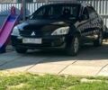 Чорний Міцубісі Lancer, об'ємом двигуна 1.6 л та пробігом 170 тис. км за 2711 $, фото 1 на Automoto.ua