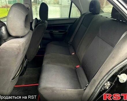 Чорний Міцубісі Lancer, об'ємом двигуна 1.6 л та пробігом 196 тис. км за 3900 $, фото 11 на Automoto.ua