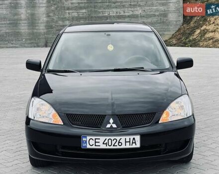 Чорний Міцубісі Lancer, об'ємом двигуна 1.6 л та пробігом 243 тис. км за 4950 $, фото 17 на Automoto.ua