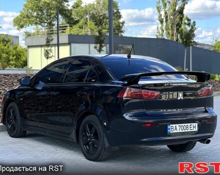 Чорний Міцубісі Lancer, об'ємом двигуна 2 л та пробігом 205 тис. км за 6500 $, фото 4 на Automoto.ua