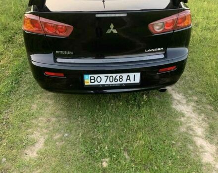 Черный Мицубиси Лансер, объемом двигателя 2 л и пробегом 208 тыс. км за 4300 $, фото 4 на Automoto.ua