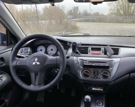 Черный Мицубиси Лансер, объемом двигателя 1.6 л и пробегом 263 тыс. км за 2900 $, фото 9 на Automoto.ua