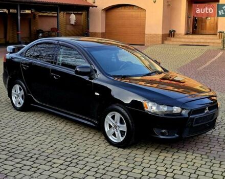 Чорний Міцубісі Lancer, об'ємом двигуна 2 л та пробігом 260 тис. км за 6555 $, фото 8 на Automoto.ua