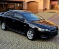 Черный Мицубиси Лансер, объемом двигателя 2 л и пробегом 260 тыс. км за 6555 $, фото 8 на Automoto.ua