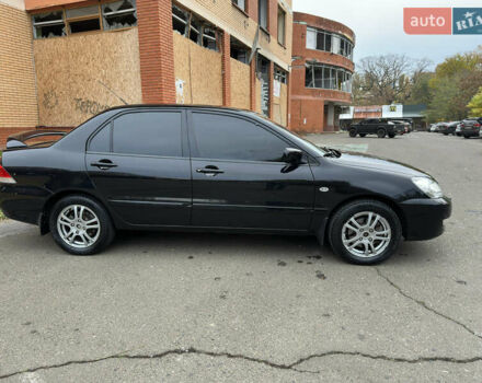 Чорний Міцубісі Lancer, об'ємом двигуна 1.58 л та пробігом 173 тис. км за 4700 $, фото 5 на Automoto.ua