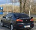 Черный Мицубиси Лансер, объемом двигателя 2 л и пробегом 224 тыс. км за 7000 $, фото 2 на Automoto.ua