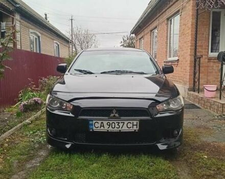 Чорний Міцубісі Lancer, об'ємом двигуна 2 л та пробігом 273 тис. км за 7100 $, фото 8 на Automoto.ua