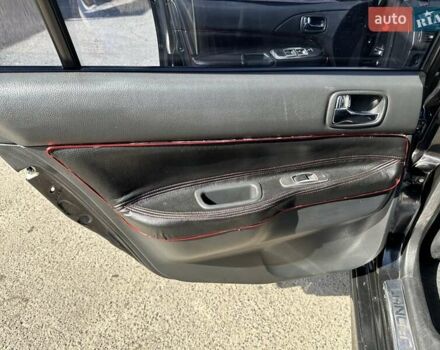 Черный Мицубиси Лансер, объемом двигателя 2 л и пробегом 272 тыс. км за 5514 $, фото 15 на Automoto.ua