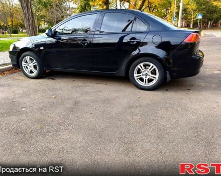 Черный Мицубиси Лансер, объемом двигателя 1.5 л и пробегом 207 тыс. км за 5500 $, фото 6 на Automoto.ua