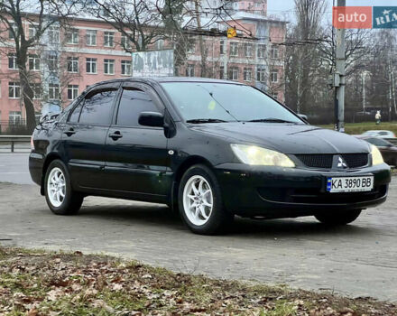 Чорний Міцубісі Lancer, об'ємом двигуна 1.6 л та пробігом 303 тис. км за 4350 $, фото 7 на Automoto.ua