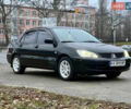 Чорний Міцубісі Lancer, об'ємом двигуна 1.6 л та пробігом 303 тис. км за 4350 $, фото 7 на Automoto.ua