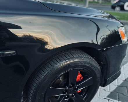 Черный Мицубиси Лансер, объемом двигателя 2 л и пробегом 245 тыс. км за 6200 $, фото 12 на Automoto.ua