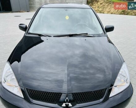 Чорний Міцубісі Lancer, об'ємом двигуна 1.6 л та пробігом 243 тис. км за 4950 $, фото 5 на Automoto.ua