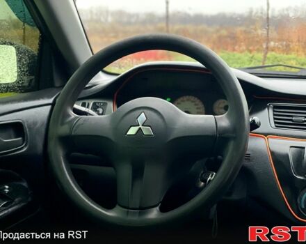 Чорний Міцубісі Lancer, об'ємом двигуна 1.6 л та пробігом 196 тис. км за 3900 $, фото 7 на Automoto.ua