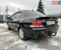 Чорний Міцубісі Lancer, об'ємом двигуна 1.6 л та пробігом 160 тис. км за 4600 $, фото 24 на Automoto.ua